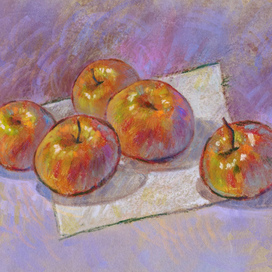 Apples on a white piece of paper